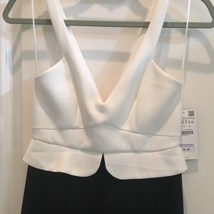 Black and white semi-peplum dress.